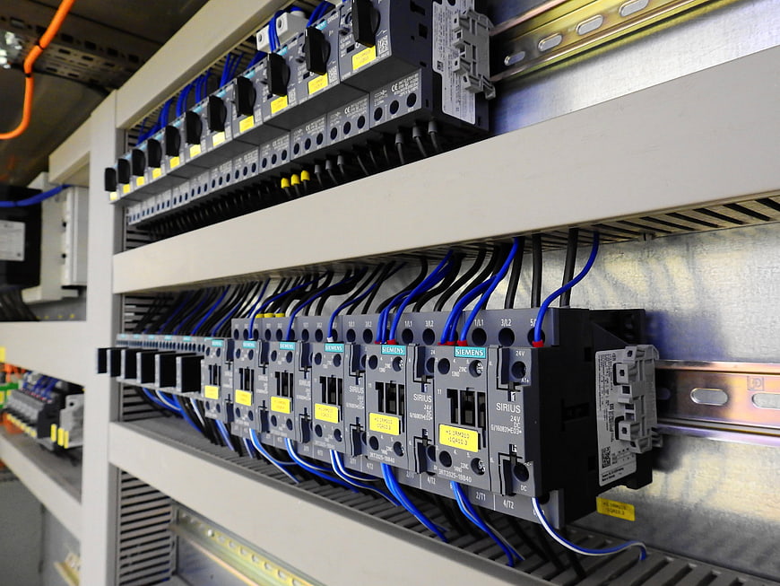 Close-up of Siemens electrical control cabinet with circuit breakers