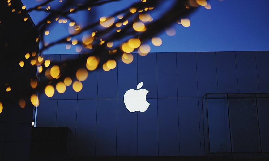 Apple Store Logo at Night with Bokeh Lights
