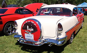 Vintage 1950s Red and White Classic Car at Outdoor Show