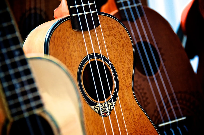 Close-up of wooden ukulele with decorative soundhole