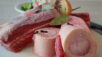 Raw Beef Marrow Bone With Spices And Bay Leaves