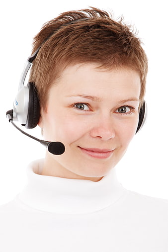 Smiling female customer support agent with headset