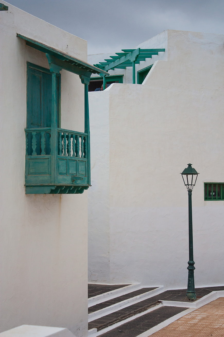 Traditional Green Balcony on White Building in Lanzarote