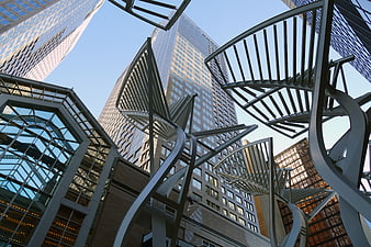 Modern Metal Sculptures in Urban Plaza with Skyscrapers