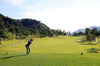 Golf Swing On Scenic Course