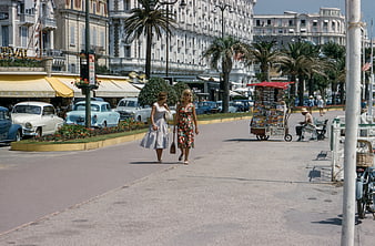Vintage 1950s French Riviera street scene with women walking