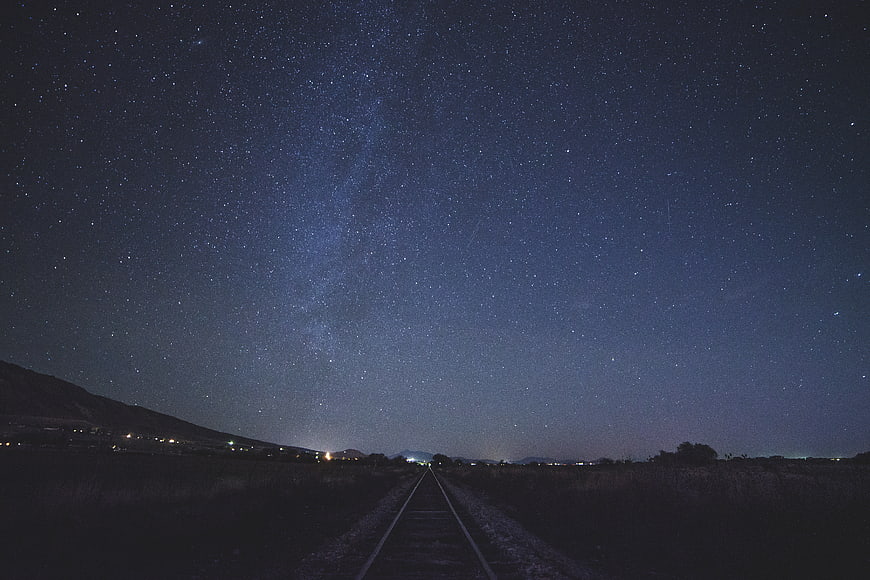 Milky Way Galaxy Over Railroad Tracks at Night