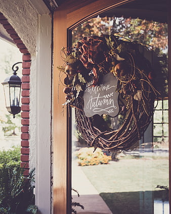 Autumn Wreath with Welcome Sign on Glass Door