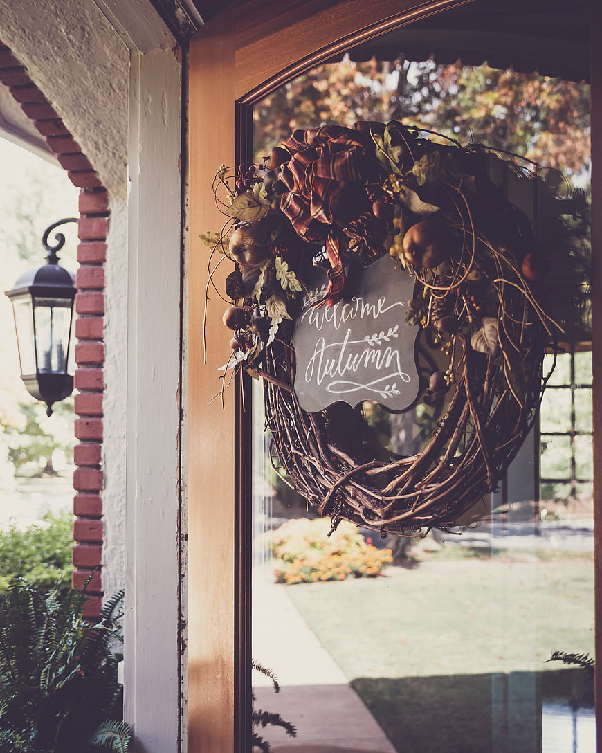 Autumn Wreath with Welcome Sign on Glass Door