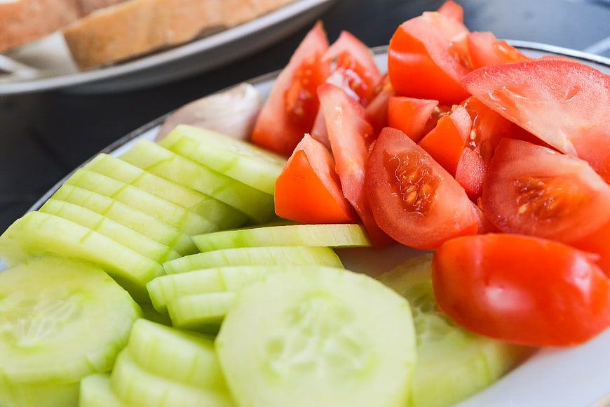 Fresh Sliced Cucumbers and Tomatoes on a Plate