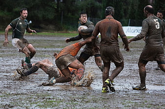 Muddy Rugby Match Action Shot