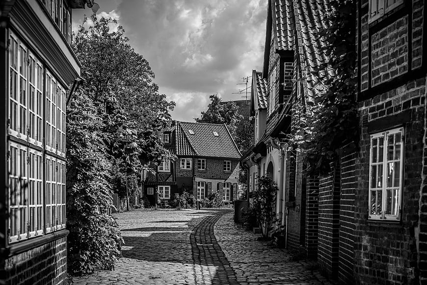 Black and white cobblestone street in historic European village