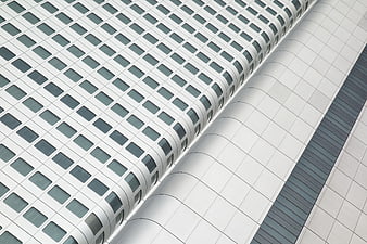 Modern White Office Building Facade with Grid Windows