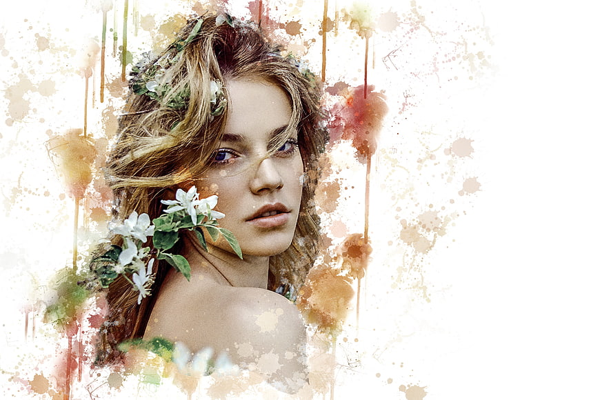 Artistic portrait of a woman with flowers and watercolor splashes