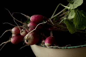 Fresh Harvested Radishes in Rustic Bowl on Black Background