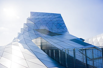 Modern Geometric Glass Architecture with Blue Tint