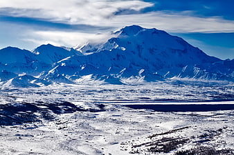 Majestic Snow-Capped Mountain Peak in Winter Landscape