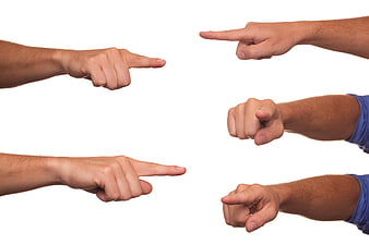 Multiple Hands Pointing Inward To Central White Space