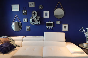 Modern Living Room with Blue Wall and White Sofa