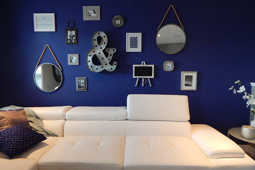 Modern Living Room with Blue Wall and White Sofa