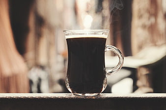 Steaming Hot Black Coffee in Glass Cup