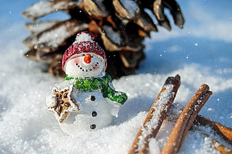 Cute Ceramic Snowman Figurine in Snow with Pinecone and Cinnamon