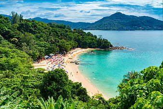 Aerial View of Tropical Beach with Turquoise Water and Lush Jungle