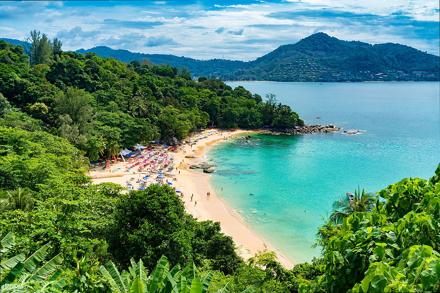 Aerial View of Tropical Beach with Turquoise Water and Lush Jungle