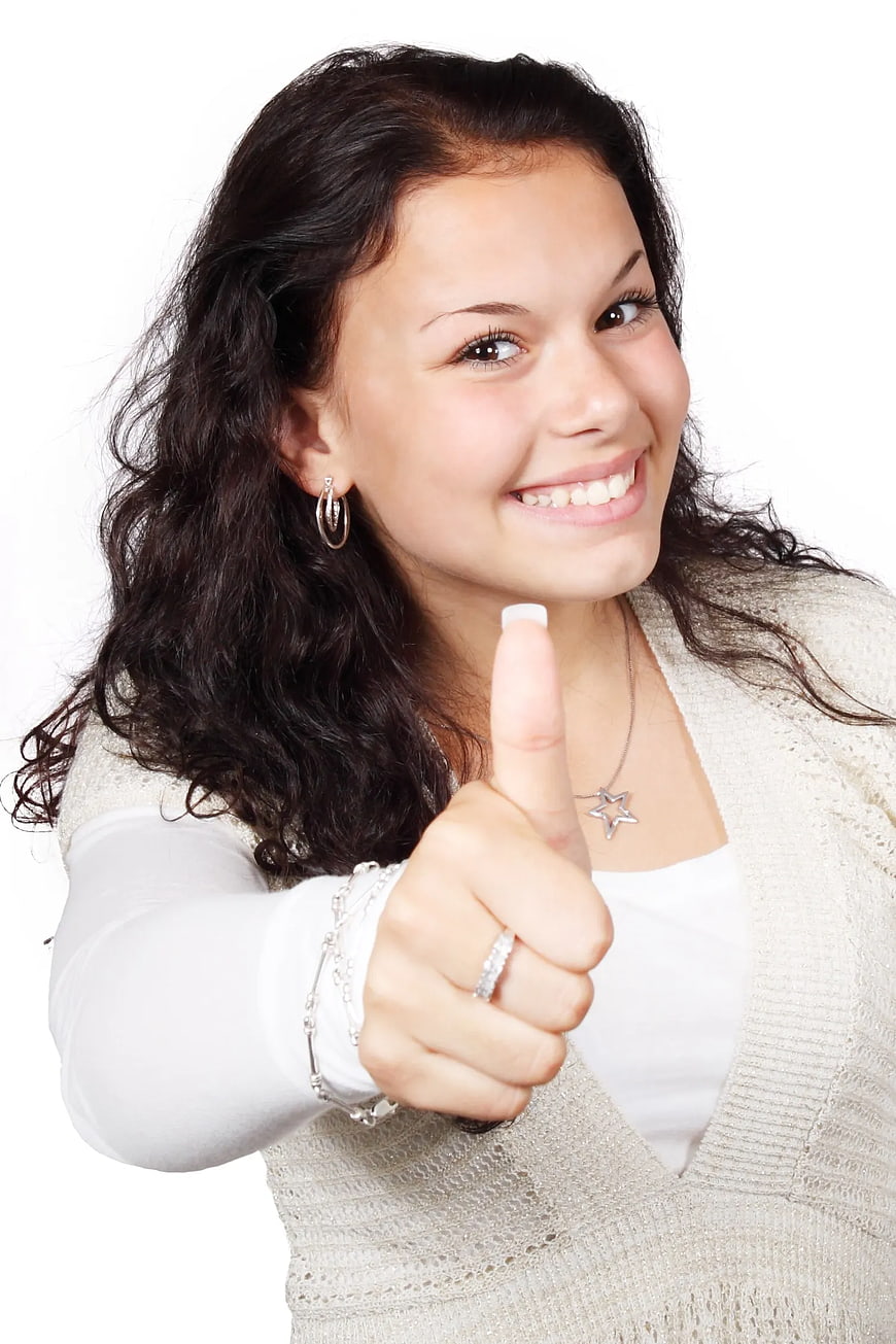Smiling Woman Giving Thumbs Up on White Background