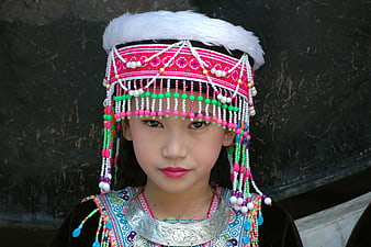 Young Girl in Traditional Ethnic Beaded Headdress and Silver Jewelry