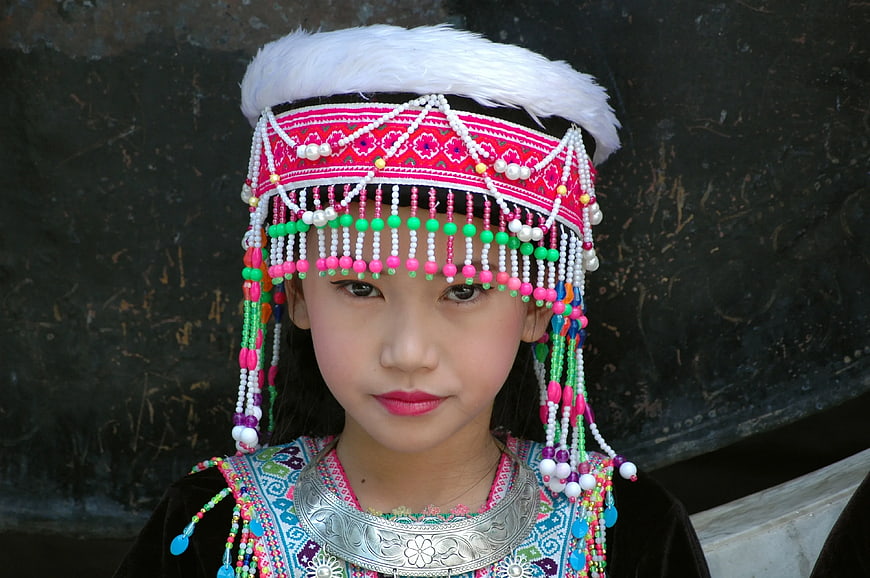 Young Girl in Traditional Ethnic Beaded Headdress and Silver Jewelry