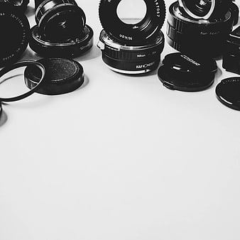 Black and White Camera Lenses on White Background