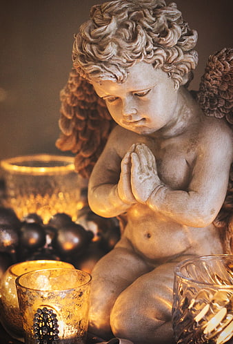 Praying Angel Statue With Candles And Ornaments