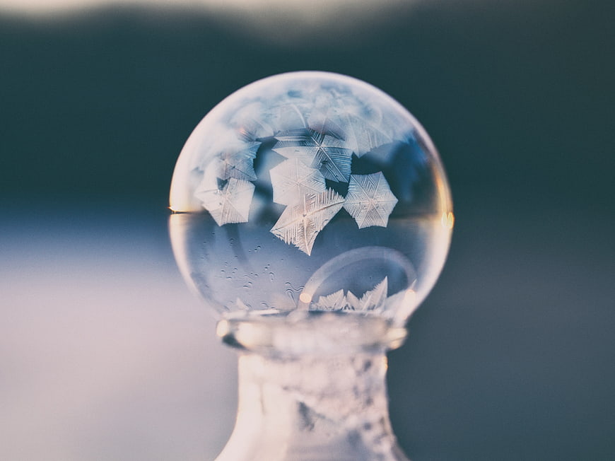 Frosted Glass Ornament with Intricate Ice Crystals