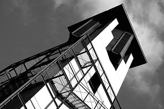 Low angle black and white modern lighthouse architecture