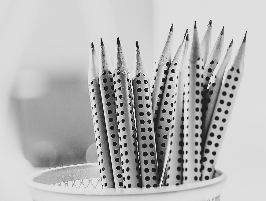 Black and white polka dot pencils in a cup