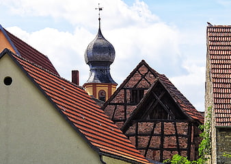 Traditional European Village Roofs and Church Onion Dome