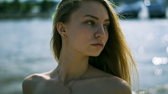 Cinematic Portrait of Woman by Water with Bokeh