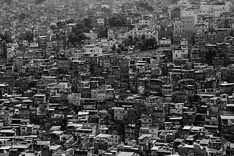 Black and white aerial view of dense hillside urban settlement