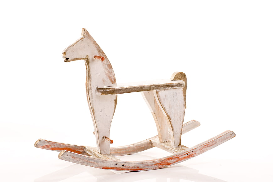Vintage White Wooden Rocking Horse Toy on White Background