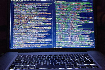 Laptop Screen Displaying Lines of Computer Source Code
