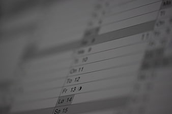 Close-up of a digital weekly calendar schedule on a computer screen
