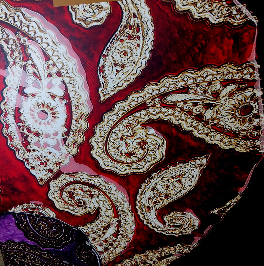 Red and White Paisley Pattern on Fabric