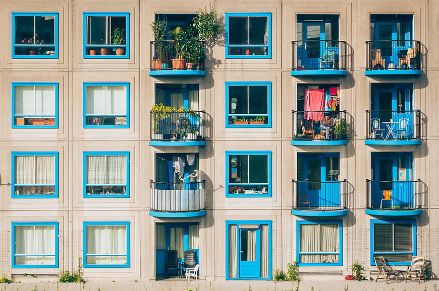 Colorful Apartment Building Facade with Blue Balconies