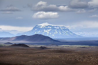 Snow-Capped Volcanic Mountain in Icelandic Landscape