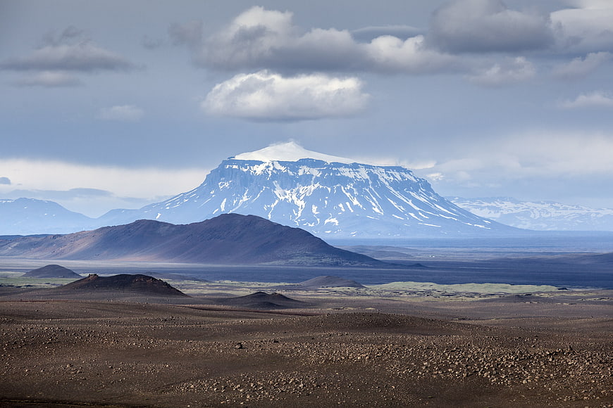 Snow-Capped Volcanic Mountain in Icelandic Landscape