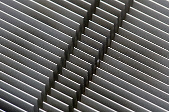 Close-up of silver aluminum heat sink fins pattern