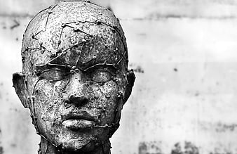 Rusty Scrap Metal Human Head Sculpture Close-Up