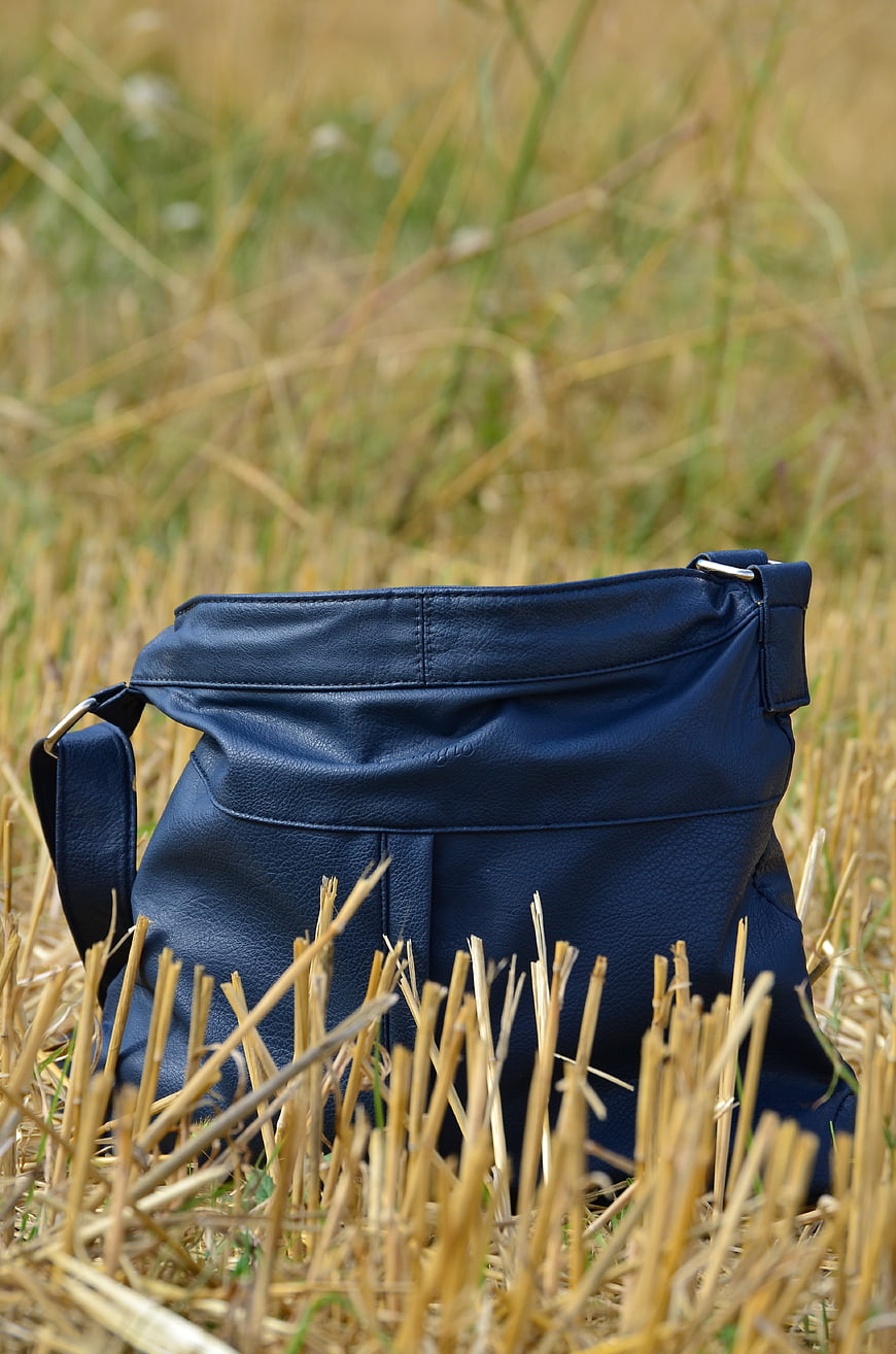 Navy Blue Leather Handbag in Dry Grass Field