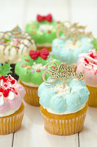 Festive Christmas Cupcakes With Pastel Frosting And Gold Toppers
